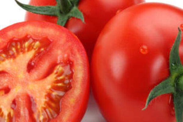 Fresh tomatoes isolated on white background